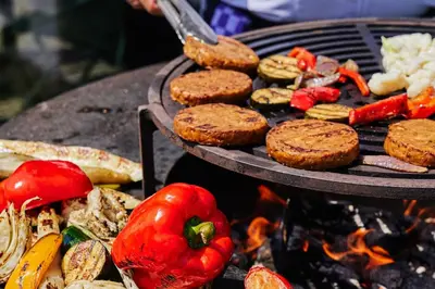 a grill with a bunch of food on it at Postillion Amersfoort Veluwemeer in Putten