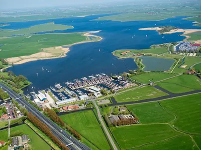 an aerial view of a city and a river at Apartment Oostergeest by Interhome in Uitgeest