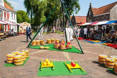 a display of fruits and vegetables at an outdoor market at Houseboat Tjonger NS003 in Monnickendam