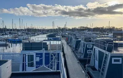 a bunch of boats docked in a marina at Monaco in Naarden