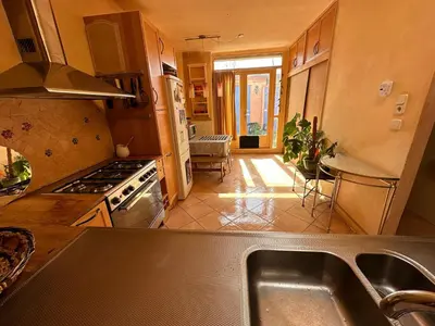 a kitchen with a sink and a stove at Homestay Room in Utrecht
