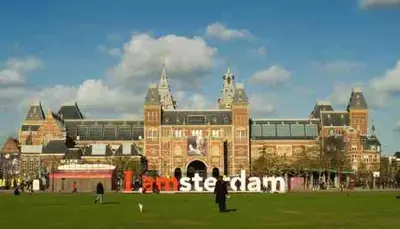 a large building with a sign in front of it at Museum district, beautiful renovated house in Amsterdam