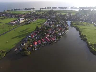 an aerial view of a river with a group of houses at Apartment Haus Jule by Interhome in Wervershoof
