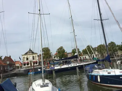 a group of boats docked in a harbor at Holiday Home Balu by Interhome in Wervershoof