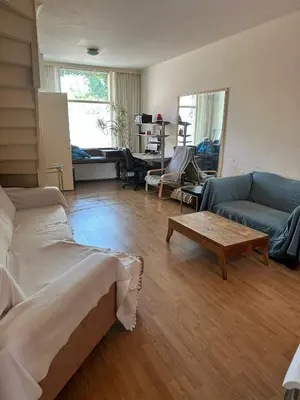 a living room with a couch and a coffee table at C-Home in Utrecht