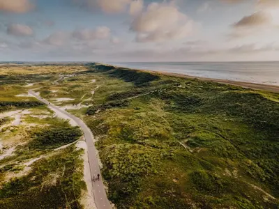 an aerial view of a road next to the ocean at Casa Vos Family Home in Zandvoort