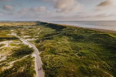 an aerial view of a road next to the ocean at Villa 't Spokeduin in Zandvoort