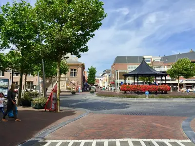 a street with a pavilion in the middle of a town at Maison Rue de la Mer in Zandvoort