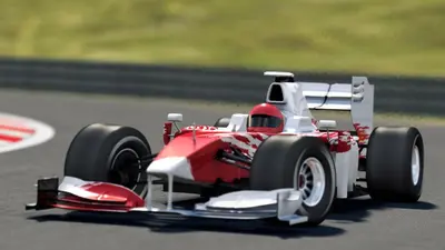 a red race car on a race track at Maison Rue de la Mer in Zandvoort