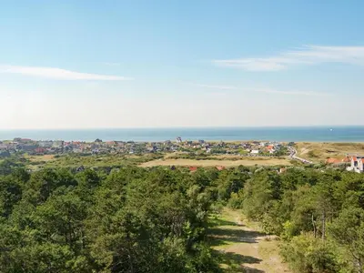 a view of the ocean from a hill at Holiday Home in Bergen near North Sea Beach in Bergen aan Zee