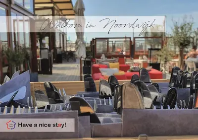 a group of chairs sitting in front of a patio at Have a nice stay! - Le Souterrain in Noordwijk aan Zee
