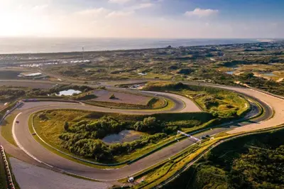 an aerial view of a winding road near the ocean at Sunny Spacious Apartment De Bijenkorf in Zandvoort