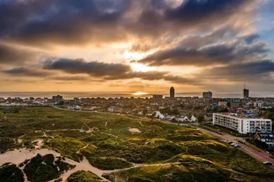 an aerial view of a city at sunset at Good Vibes Romantic Studio incl free private parking in Zandvoort