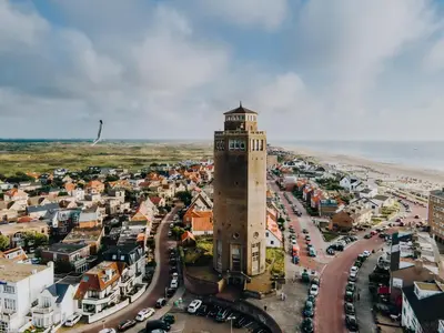 an aerial view of a city with a clock tower at De Boulevard 2 in Zandvoort