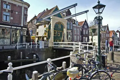 a group of bikes parked next to a canal at Villa Prinsenhof # Vierendertig in Bergen