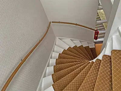 a spiral staircase in a building at Villa Prinsenhof # Vierentwintig in Bergen