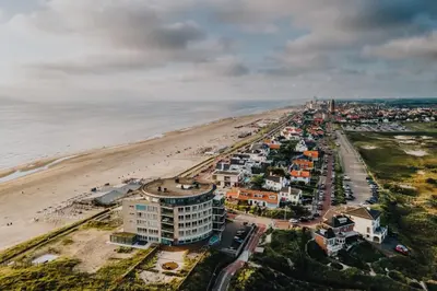 an aerial view of a beach and a city at Little Buddha in Zandvoort