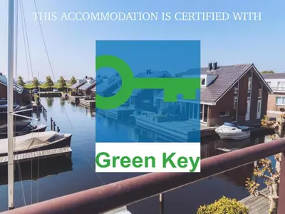 a collage of photos of a marina with the words green key at Tiny houseboat Uitgeest I in Uitgeest