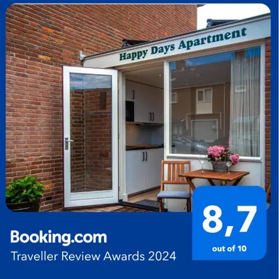 a door with a sign that reads happy days apartment at Happy Days Apartment - Luxurious - Free parking on own property in Zandvoort