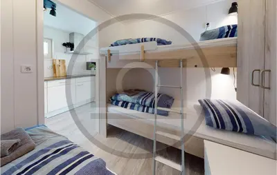 a room with two bunk beds in a room at Amazing Ship In Aalsmeer in Aalsmeer